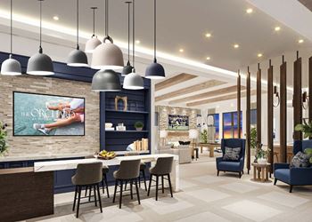 a rendering of a lobby with a table and chairs